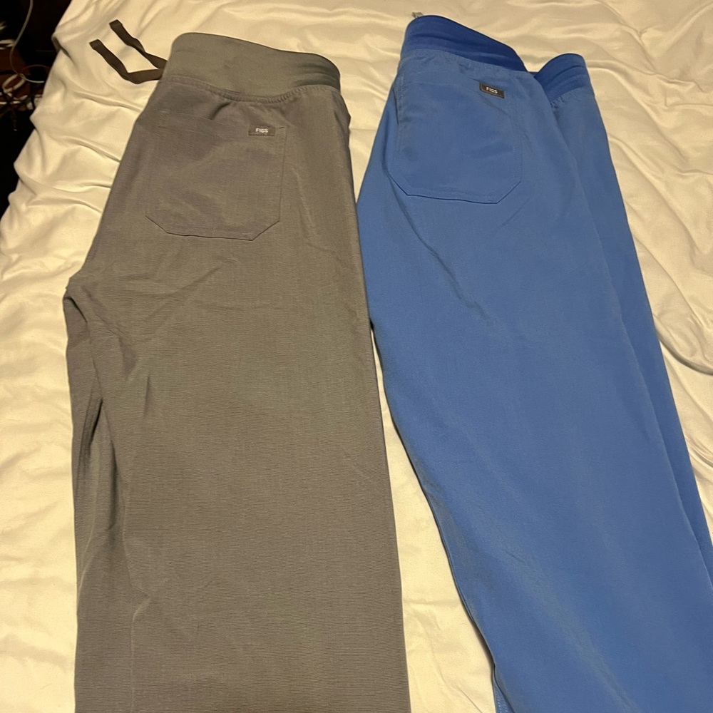 Figs scrubs in a size small. Light blue and grey.